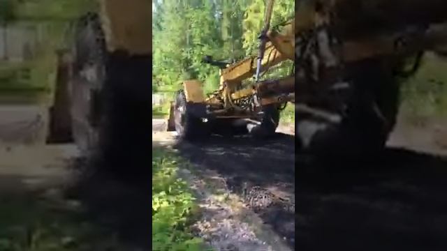 Ремонт асфальтной крошкой центральной дороги в СНТ "Невское" Мшинская