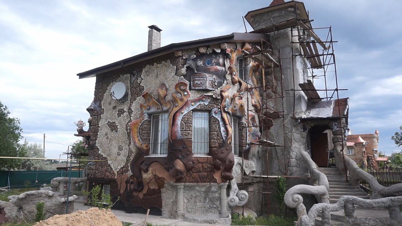 оформление  фасада утеплённого  пенопластом,   декоративная  штукатурка.