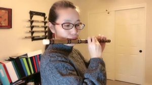 Bamboo flute—toothless lady learning to play the flute