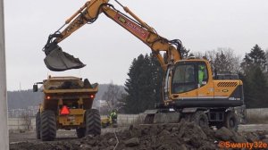 4K| Hyundai Robex 140W-9A Wheeled Excavator Loading Hydrema 912FS