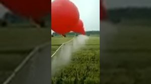 Опрыскивание полей в Китае с помощью воздушных шаров
