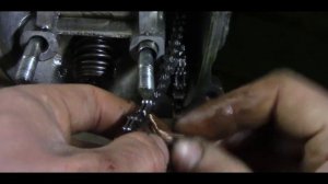 способ замены цепи ГРМ без разборки двигателя.