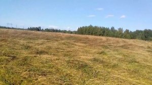 Сенокос на новой косилке КРН 2.1 Крестник за рулём трактора.