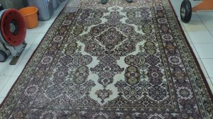 стирка шерстяного ковра