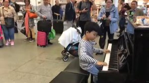 St pancras station in London. Street piano “secret”