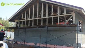 Монтаж фибролитовых плит NORDECO на стены каркасного дома.