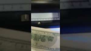 100 долларов.Проверка на подлинность