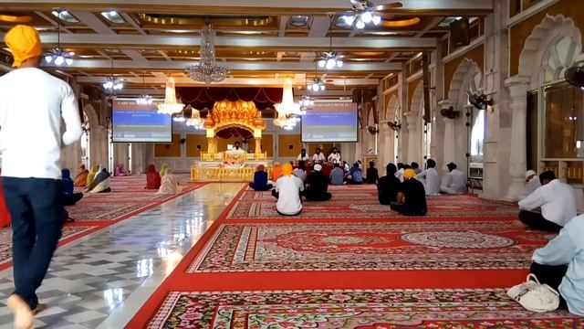 Служба в храме сикхов Gurudwara Sri Guru Singh Sabha. Бангкок. Королевство Таиланд.