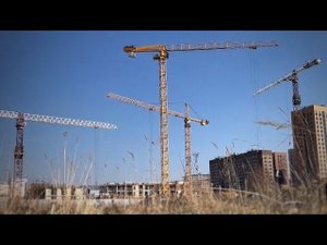 Стройка. Башенный кран SCM LIEBHERR POTAIN. Измайлово с высоты. Tower crane