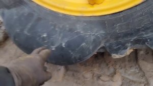 тракторная шина Нортек 16.9-28. Отслоение бескамерного слоя и расслоение шины