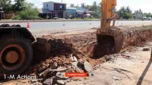 HYUNDAI 210W WORK WIHT DUMP TRUCK NEAR HIGH WAY.Y27