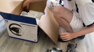Распаковка игрового руля для PS5, Thrustmaster T-GT II.