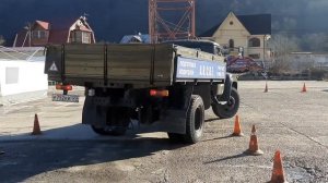 Категория С.Заезд задним ходом в бокс.