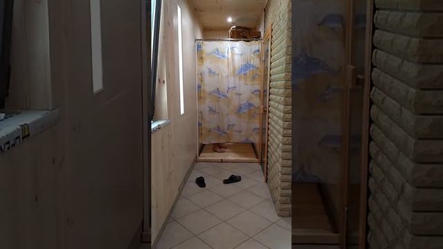 Test of waterfall-bucket and curtain for a shower in the sauna.