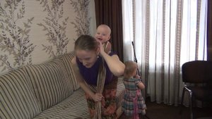 Как я выполняю намотку слинга за спиной