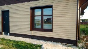 Обшивка сайдингом деревянного дома