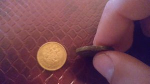 Как отличить поддельную монету от оригинала?