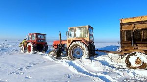 На улице -10. Вытаскиваем трактор, застрявший в поле