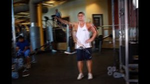 Отведение руки в сторону на нижнем блоке