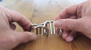 Hanayama Devil's Claw Puzzle Solution - Double m Metal Ring Puzzle Solution
