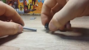 Как из лего сделать катапульту, которая стреляет динамитом.