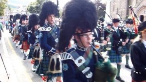 Scottish Bagpipe Band marching through Ballater, August 2012