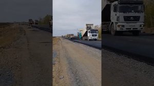 ПК 5+50 Устройство нижнего слоя покрытия из плотного крупнозернистого асфальтобетона