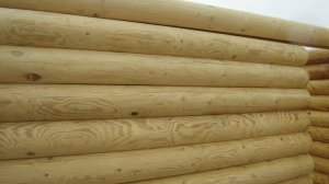 Погрузка сруба и пропитка льняным маслом на производственной площадке ГК "АльфаЛес"