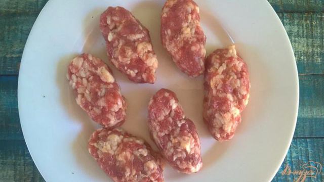 Пальчики из свинины тушеные с капустой