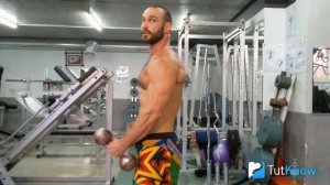 Махи гантелей перед собой стоя