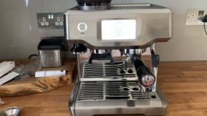 Cleaning the group head on a breville barista touch sage barista touch espresso machine. ASMR.