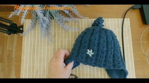 Шапочка на ребенка 6 - 9 месяцев спицами