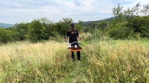Stihl autocut C 26-2 and Stihl 250 mm brunsh knife with Stihl Fsa 135 battery in big grass.