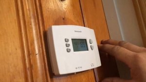 how to change batteries in a thermostat