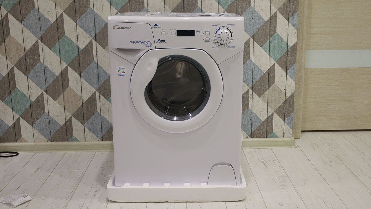 Candy Aquamatic 2D1140 07 - компактная стиральная машина под раковину