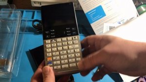 Unboxing 3 Graphing Calculators: Casio fx-CG50, HP Prime, TI-83 Plus.