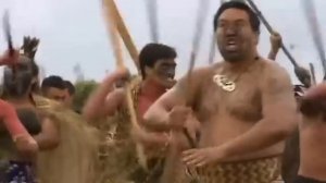 Hundreds of Maori warriors in battle haka