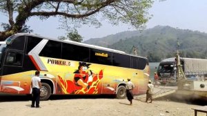 Bus Loading on Ferry on the Road from Mrauk-U, Myanmar