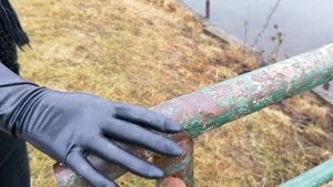 Long Black Latex Gloves outdoors walk