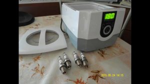 Чистка свечей щеткой и в ультразвуковой ванне.