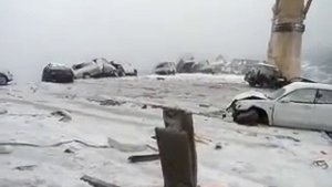Япония Новости автомобили смыло штормом