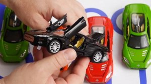 Машинка металлическая Spyker C8 открываются двери багажник капот - обзор на канале Папа Рулит