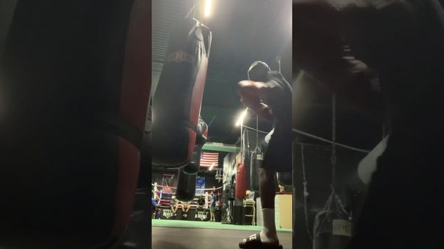 Devone Allamlyjr hits the heavy bag