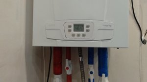 Показываю как убавить температуру на котле Baxi Eco Home 24F