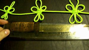 Нож из быстрореза с наборной берестяной рукоятью.