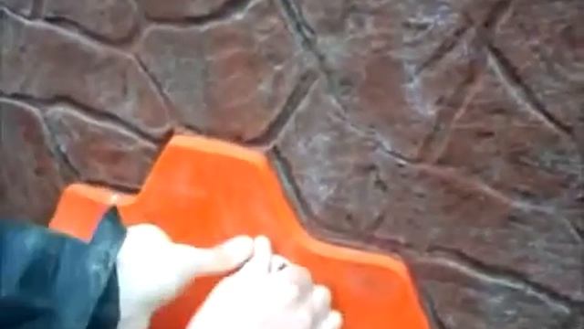 Имитация каменной кладки из штукатурки с помощью штампа