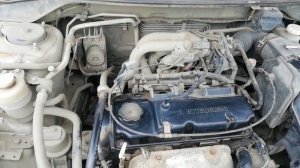 замена свечей lancer 9