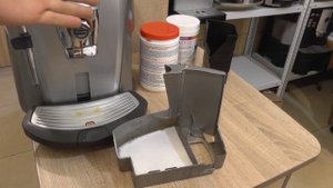 Чем отмыть поддон кофемашины?