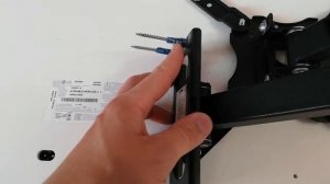 Какой крепёж использовать для кронштейна телевизора с большим выходом (коленом)? Анкер или?