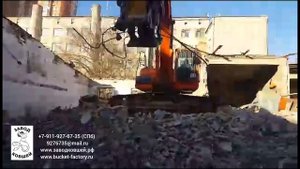 работа экскаватора крашером видео